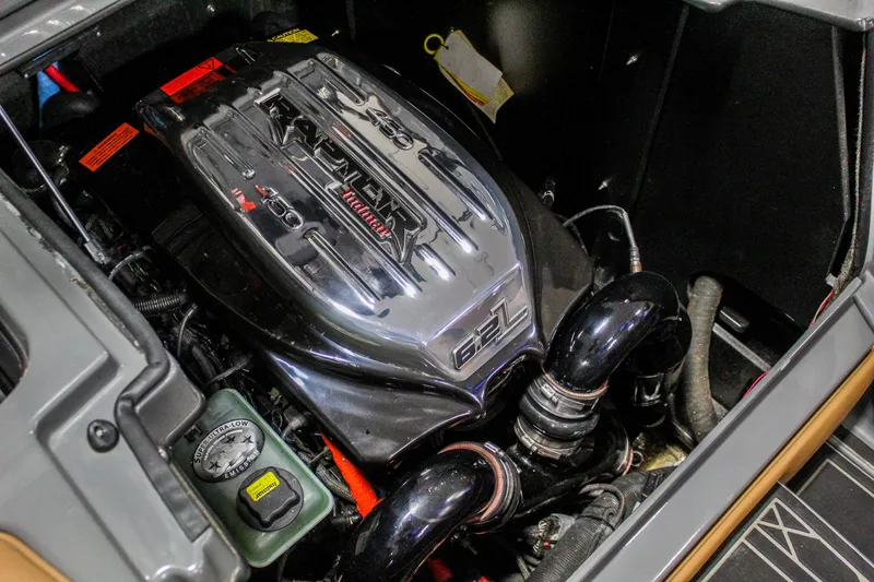 Slide: The Image of 2021 Tigé 25ZX engine compartment showcasing powerful 6.2L motor with detailed components. - 39