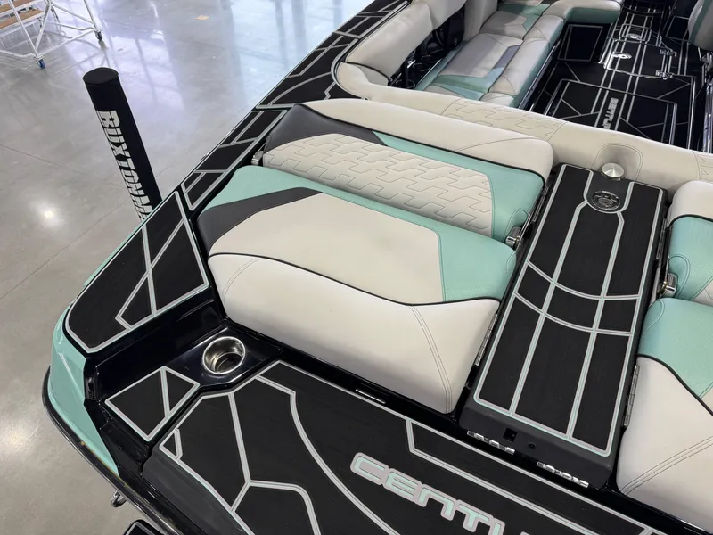 Slide: The Image of 2024 Centurion RI 245 boat interior with stylish seating and modern design. - 12