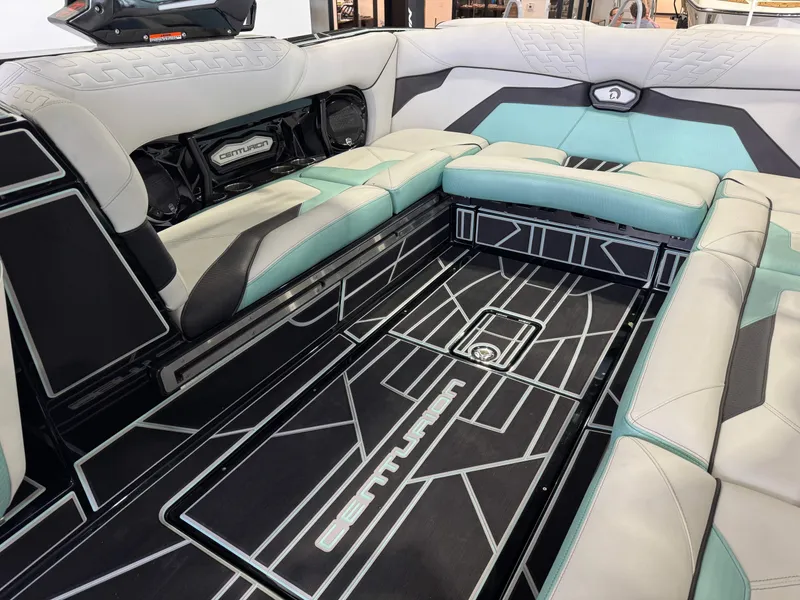 Slide: The Image of 2024 Centurion RI 245 boat interior with modern seating and stylish flooring design. - 15
