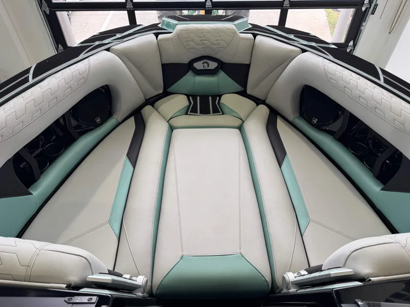 Slide: The Image of 2024 Centurion RI 245 boat interior with luxurious seating and modern design. - 17