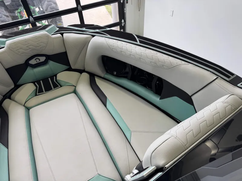 Slide: The Image of 2024 Centurion RI 245 boat interior with stylish upholstery and modern design. - 18