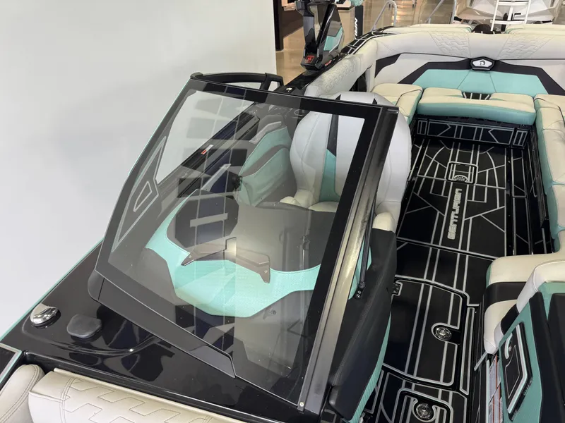 Slide: The Image of 2024 Centurion RI 245 boat interior with modern seating and sleek design. - 20