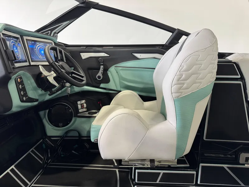 Slide: The Image of 2024 Centurion RI 245 boat interior with modern dashboard and stylish seating. - 23