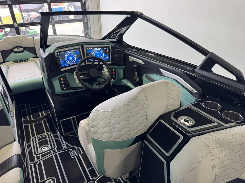 Slide: The Image of 2024 Centurion RI 245 boat interior with modern dashboard and seating. - 24