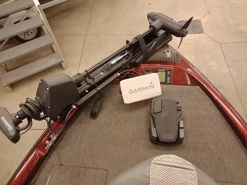 Slide: The Image of 2001 Triton TR186 sc boat deck with Garmin trolling motor and foot pedal. - 16