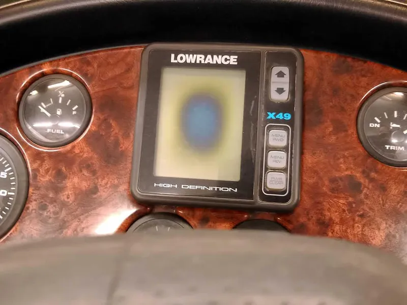 Slide: The Image of Dashboard of 2001 Triton TR186 sc with Lowrance X49 fishfinder and gauges. - 25
