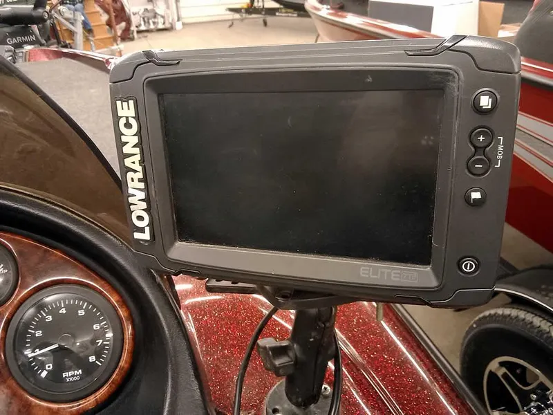 Slide: The Image of Lowrance Elite fish finder on 2001 Triton TR186 sc boat dashboard. - 26