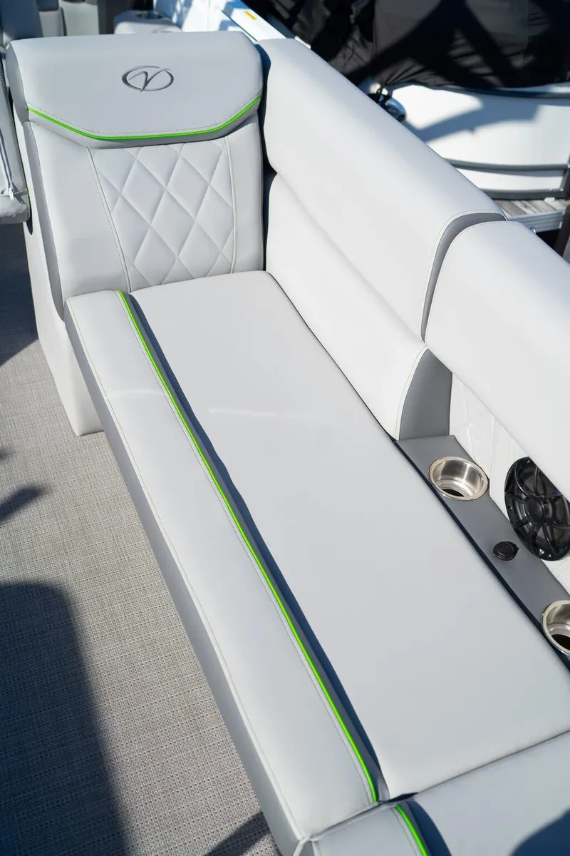 Slide: The Image of 2024 Veranda Vertex 25RL boat seating with elegant design and cup holders. - 14