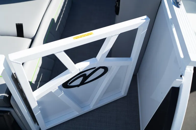Slide: The Image of 2024 Veranda Vertex 25RL boat interior with open gate and seating. - 5