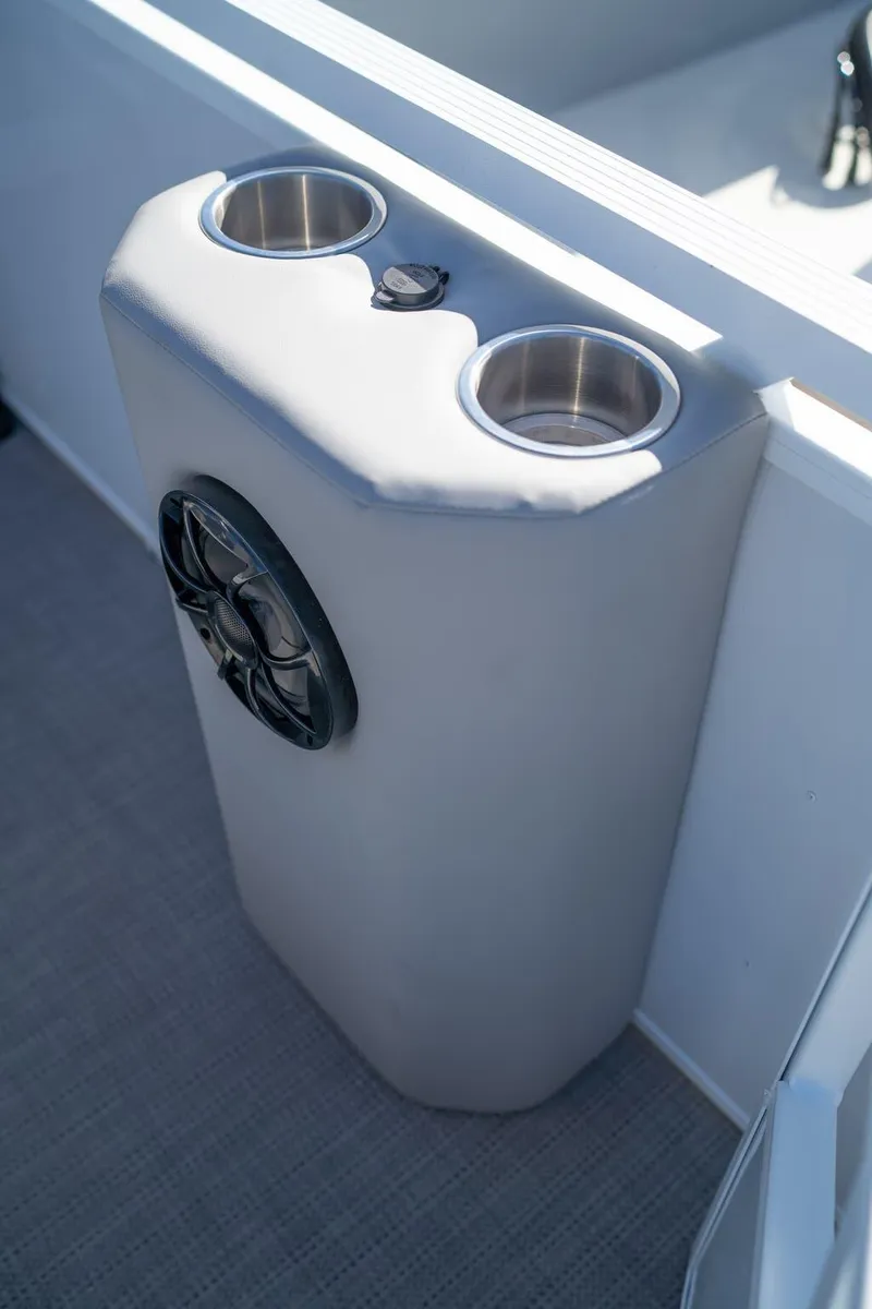 Slide: The Image of 2024 Veranda Vertex 25RL boat cup holders and speaker detail. - 6