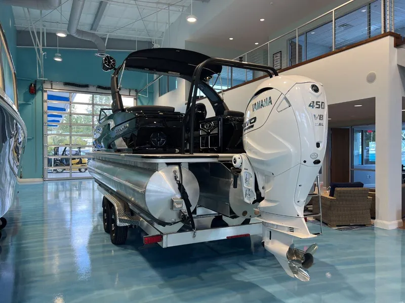Slide: The Image of 2024 Veranda V One 25 pontoon boat with Yamaha 450 V8 engine in showroom. - 3