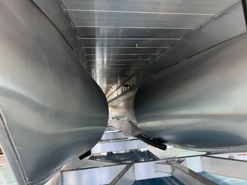 Slide: The Image of 2024 Veranda V One 25 pontoon boat undercarriage, showcasing sleek aluminum construction. - 5