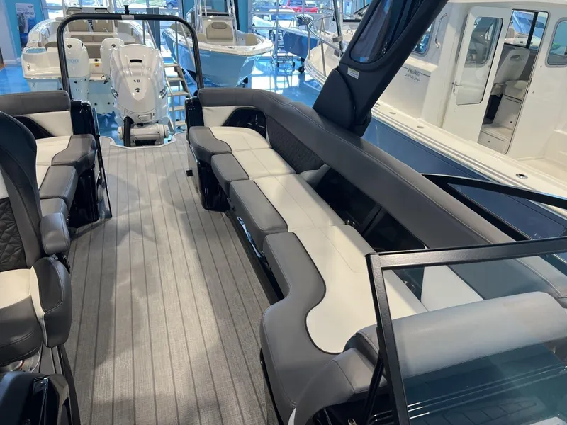 Slide: The Image of 2024 Veranda V One 25 boat interior with spacious seating and modern design. - 8