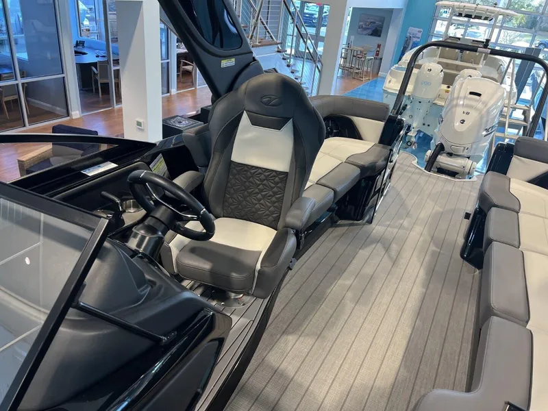 Slide: The Image of 2024 Veranda V One 25 boat interior with sleek seating and modern design. - 9