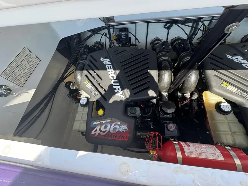 Slide: The Image of Engine compartment of a 2002 Baja .38 Special boat with MerCruiser 496 MAG HO engine. - 13