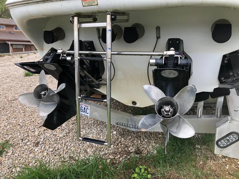 Slide: The Image of Rear view of a 2002 Baja .38 Special boat with dual propellers and ladder. - 3