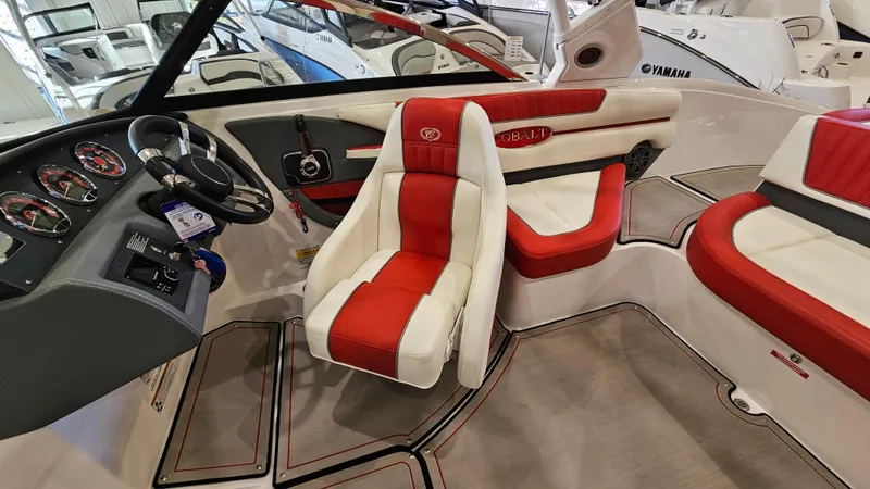Slide: The Image of Interior of a 2020 Cobalt CS22 boat with red and white seating. - 12