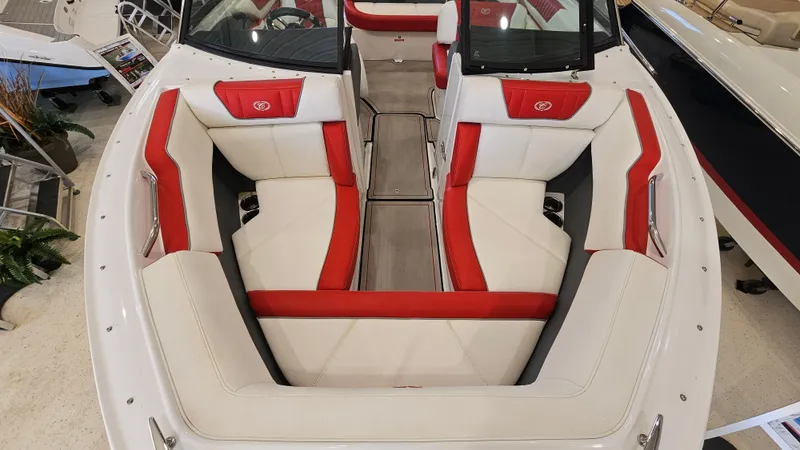 Slide: The Image of 2020 Cobalt CS22 boat interior with red and white seating, showcasing luxury design. - 16