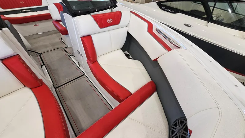 Slide: The Image of 2020 Cobalt CS22 boat interior with red and white seating, showcasing luxury design. - 17