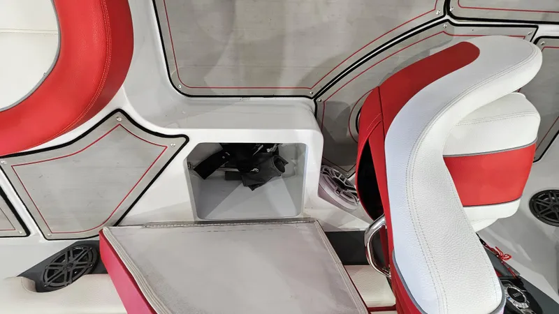 Slide: The Image of Interior of 2020 Cobalt CS22 boat with red and white seating and storage compartment. - 22