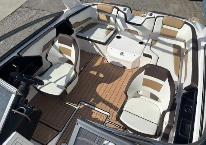 Slide: The Image of 2022 Yamaha Boats 195S interior with stylish seating and modern design. - 22