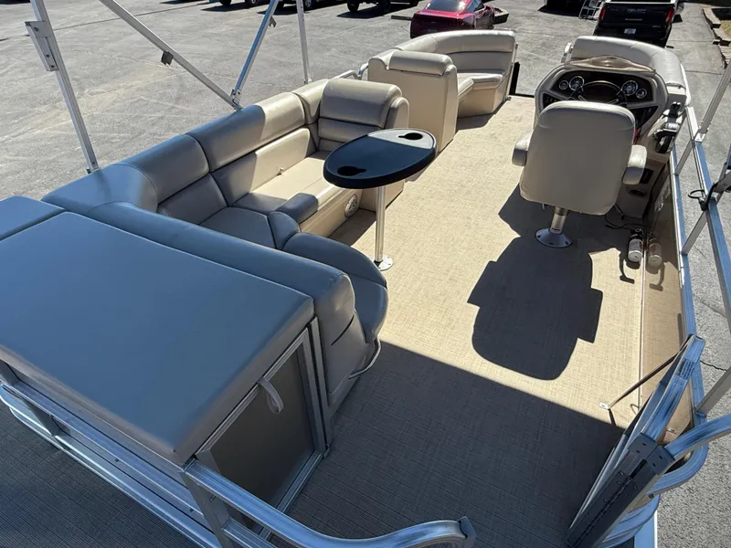 Slide: The Image of 2019 South Bay 222CR pontoon boat with spacious seating and modern interior design. - 14