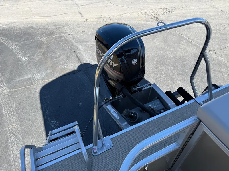 Slide: The Image of 2019 South Bay 222CR boat with Mercury outboard motor and swim ladder. - 24