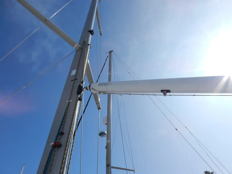 Slide: The Image of Mast and rigging of 2005 Beneteau First 44.7 sailboat against clear blue sky. - 18