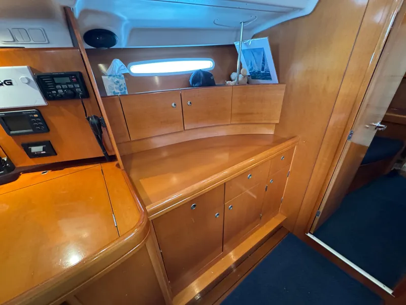 Slide: The Image of Interior of 2005 Beneteau First 44.7 yacht with wooden cabinetry and modern design. - 25