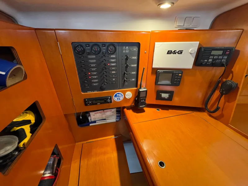 Slide: The Image of Control panel of a 2005 Beneteau First 44.7 yacht with navigation equipment. - 26