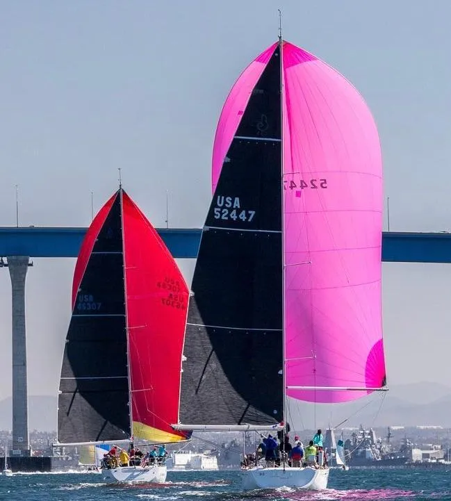Slide: The Image of Sailboats racing with colorful spinnakers, featuring a 2005 Beneteau First 44.7 model. - 3