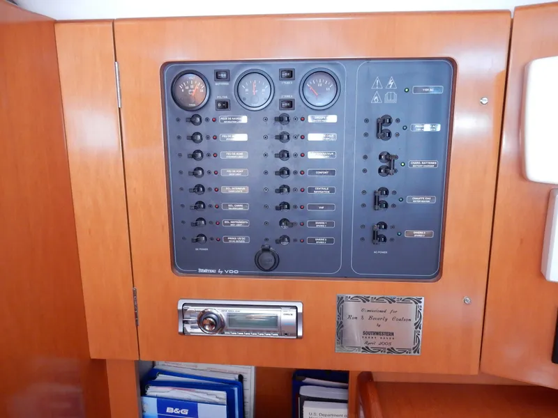 Slide: The Image of Electrical control panel on a 2005 Beneteau First 44.7 yacht interior. - 6