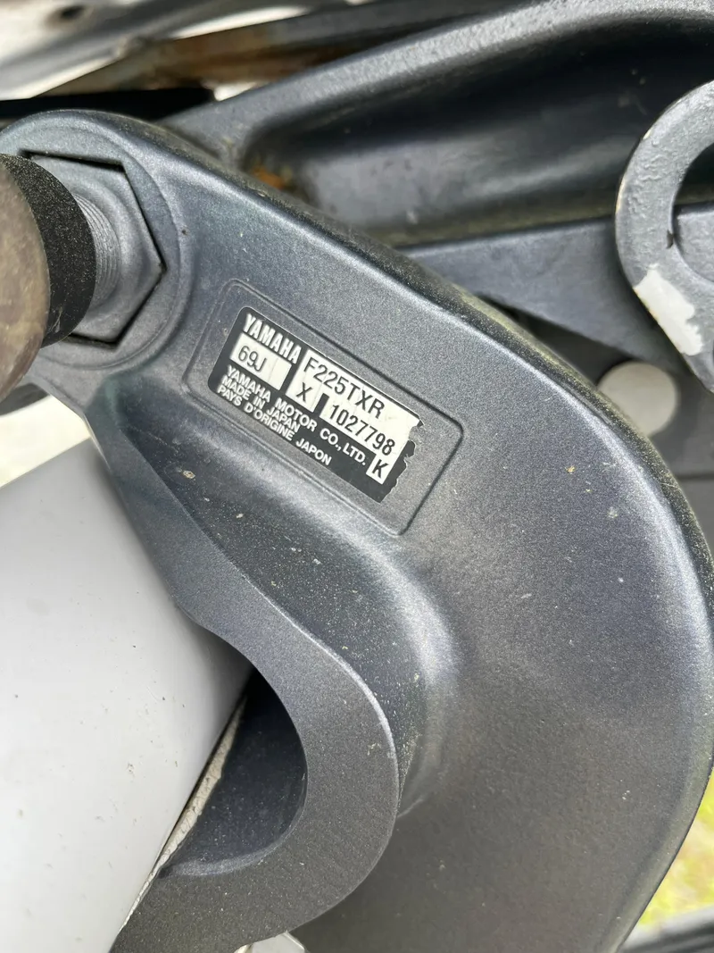 Slide: The Image of Close-up of Yamaha F225TXR engine part on 2007 Seastrike 240 boat. - 16