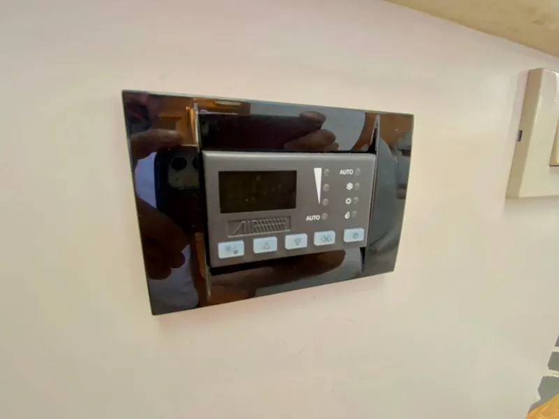 Slide: The Image of Control panel on 1999 Silverton 392 Motor Yacht interior wall. - 31