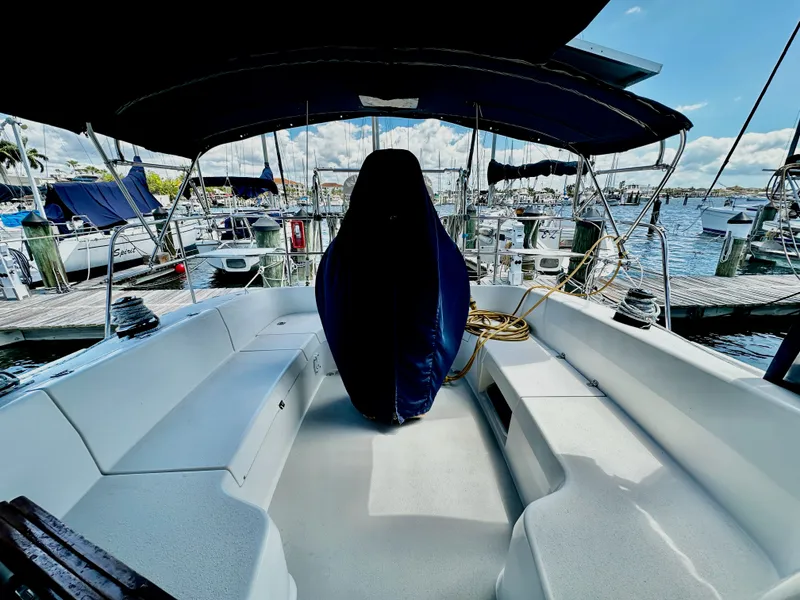 Slide: The Image of 2005 Catalina 350 yacht docked, sunny day, empty seating area. - 37