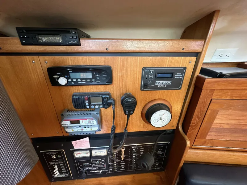 Slide: The Image of Interior view of a 2005 Catalina 350 boat with navigation system. - 44