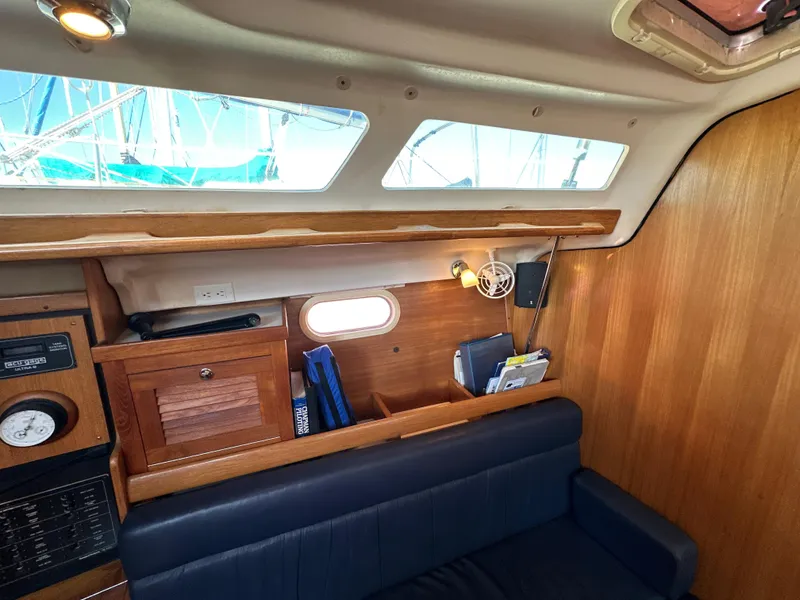Slide: The Image of Interior of a 2005 Catalina 350 yacht with wooden furnishings. - 47