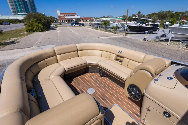 Slide: The Image of Luxurious 2015 South Bay 724 SPORT DLX pontoon boat with spacious seating and elegant design. - 12