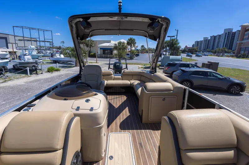 Slide: The Image of 2015 South Bay 724 SPORT DLX pontoon boat with spacious seating and modern design. - 13