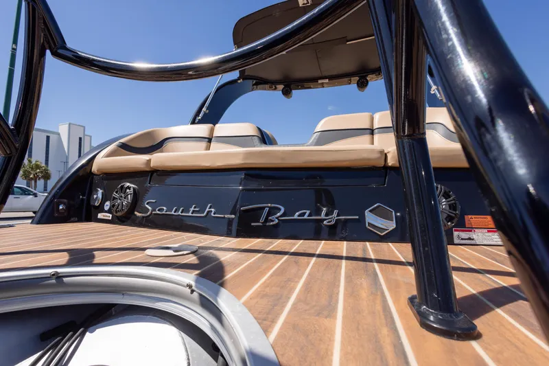 Slide: The Image of 2015 South Bay 724 SPORT DLX boat with sleek design and comfortable seating. - 19