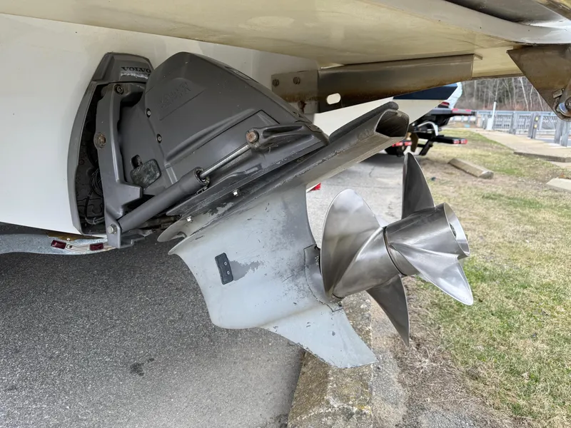 Slide: The Image of 2013 Cobalt 242 boat propeller and outdrive on a trailer. - 7