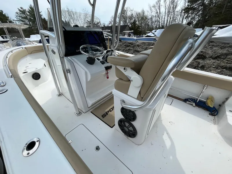 Slide: The Image of 2017 Sportsman 252 boat interior with helm, seating, and steering wheel. - 32