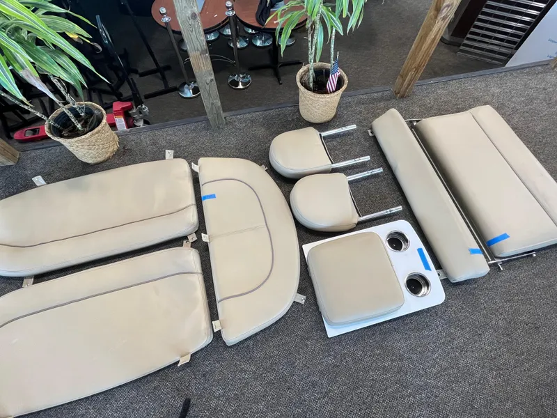 Slide: The Image of Boat seat cushions and parts for 2017 Sportsman 252 model, arranged on carpeted floor. - 33