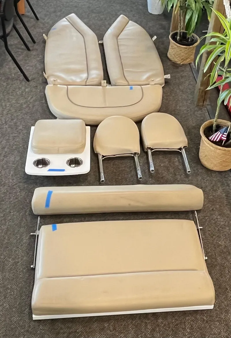 Slide: The Image of Boat seat cushions and accessories for 2017 Sportsman 252 model, arranged on carpet. - 34