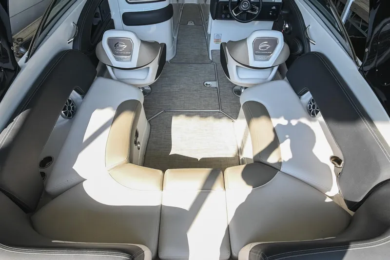 Slide: The Image of Interior of 2021 Crownline 265 SS boat, featuring spacious seating and modern design. - 10