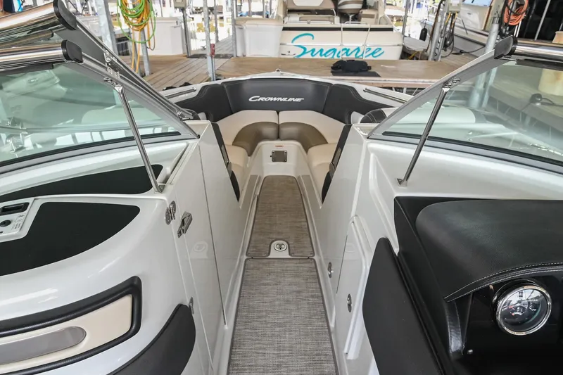 Slide: The Image of Interior view of 2021 Crownline 265 SS boat, featuring sleek seating and modern design. - 31