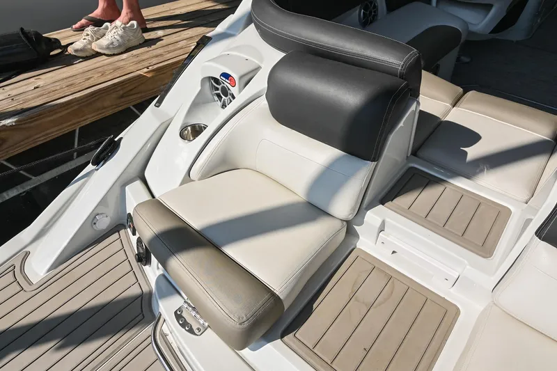 Slide: The Image of 2021 Crownline 265 SS boat seating with beige and black upholstery. - 39