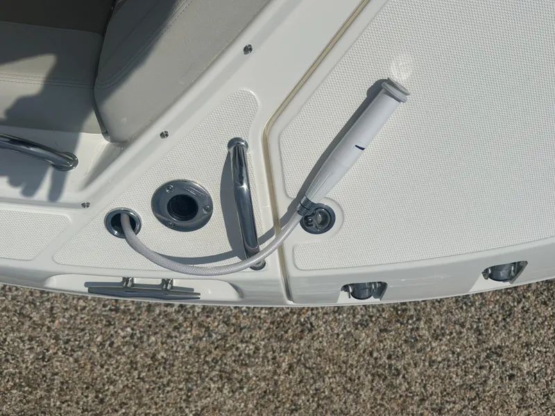 Slide: The Image of 2025 Boston Whaler 280 Vantage boat deck with shower hose and fittings. - 28