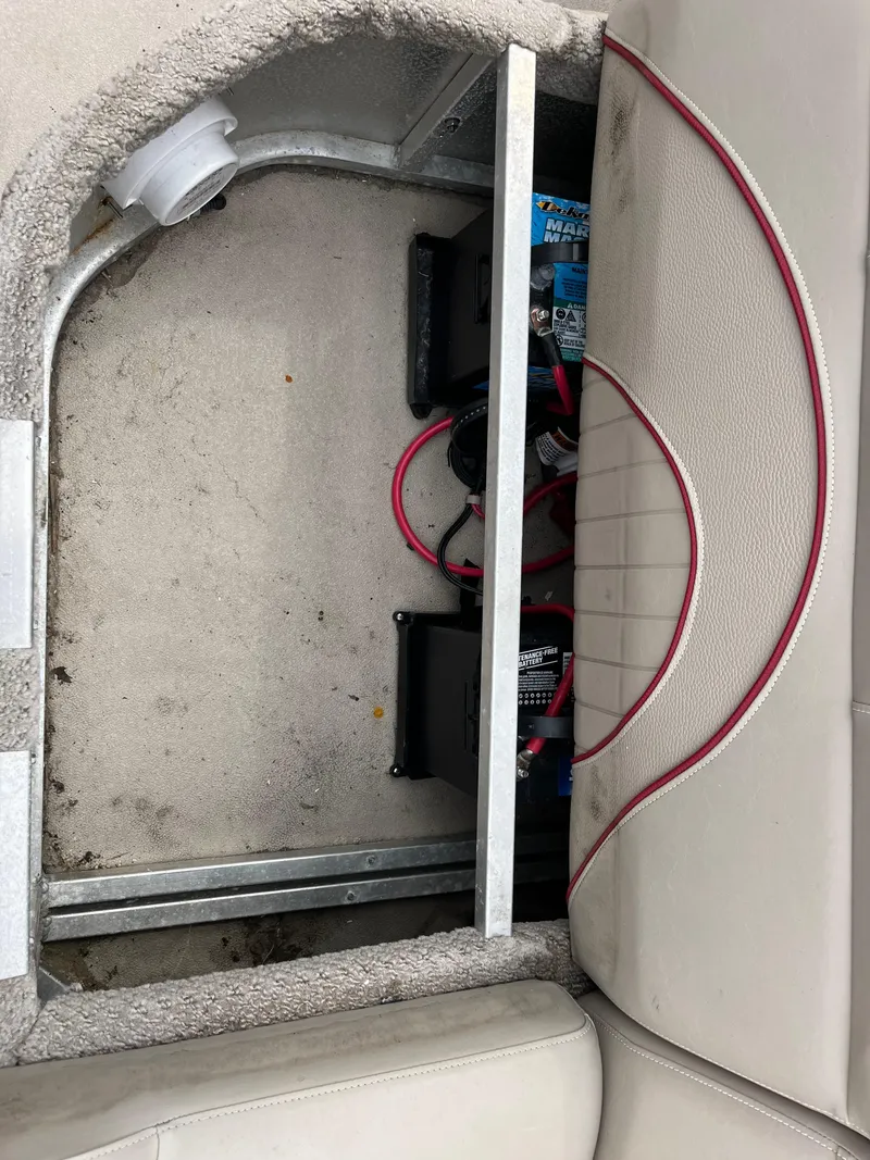 Slide: The Image of Battery compartment of 2014 Avalon CATALINA 22 with visible wiring and components. - 15