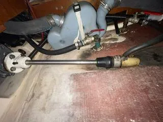 Slide: The Image of Mechanical components inside a 2000 Beneteau Oceanis 311 sailboat, showing pipes and fittings. - 29